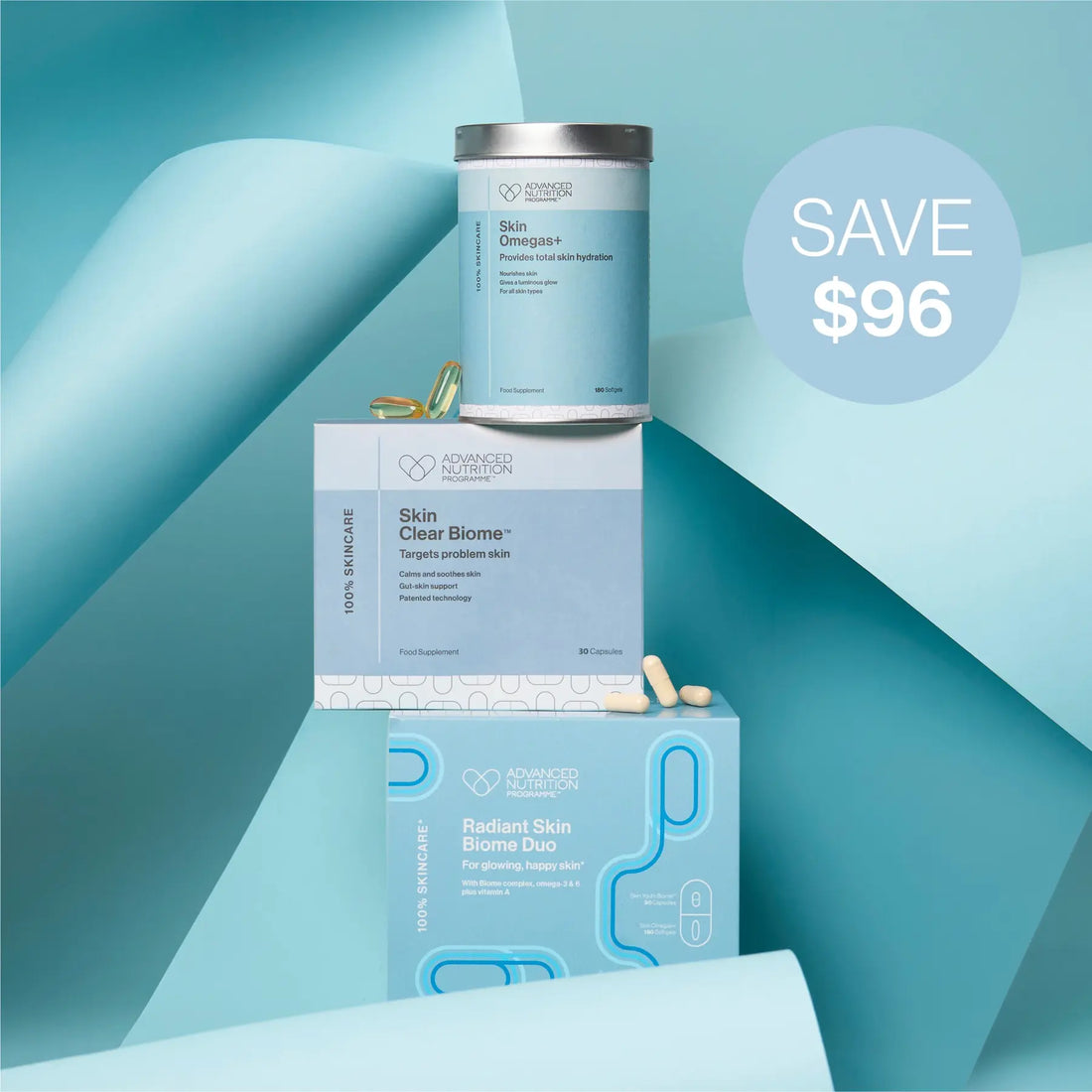 Advanced Nutrition Programme™ Radiant Skin Biome Duo, Skin Clear Biome™ and Skin Omegas+ displayed on a blue geometric background with capsules and a Save $96 offer.