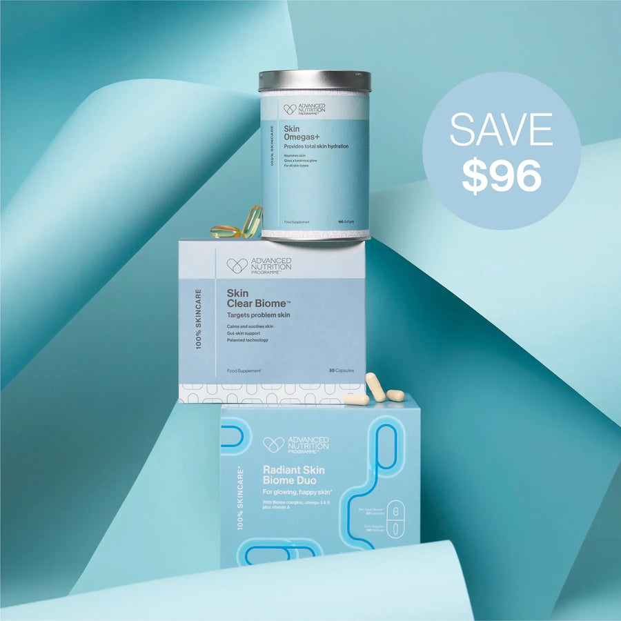 Advanced Nutrition Programme™ Radiant Skin Biome Duo, Skin Clear Biome™ and Skin Omegas+ displayed on a blue geometric background with capsules and a Save $96 offer.